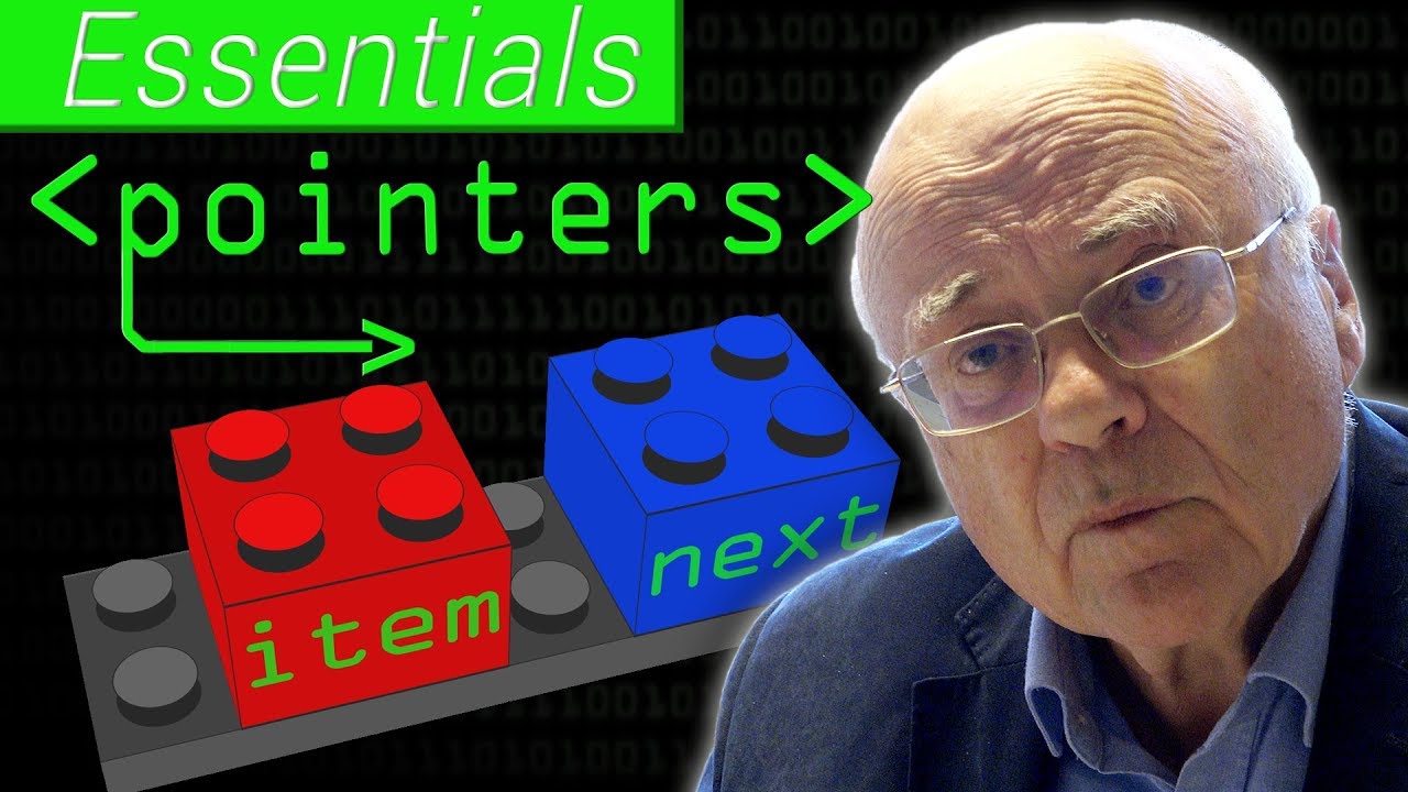 Youtube thumbnail, man with glasses and two lego blocks behind him.